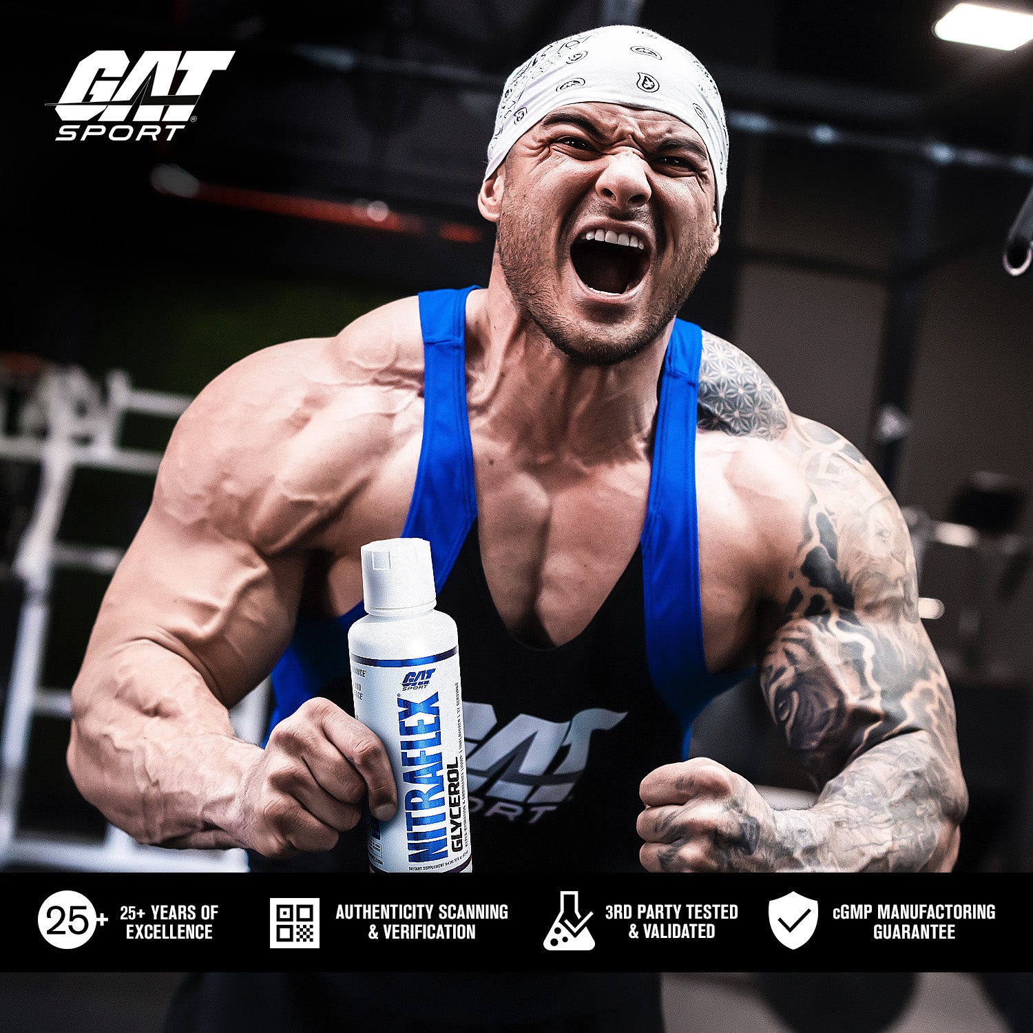 Muscular man holding a GAT Sport supplement bottle in a gym setting